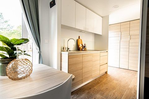 Knus Tiny House op een bosrijk vakantiepark - 4