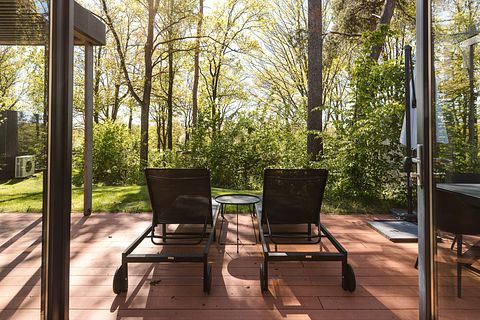 Lodge with an outdoor hot tub and a view - 5