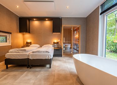 Wellness-Hütte mit Sauna und Whirlpool im Wald - 9