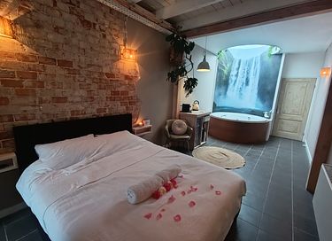 Romantische suite met jacuzzi en sauna