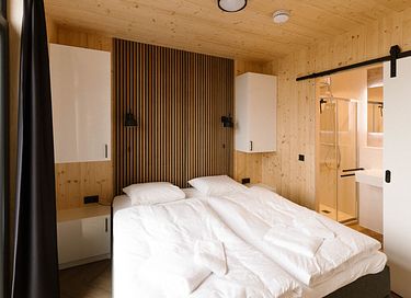 Lodge with an outdoor hot tub and a view - 12