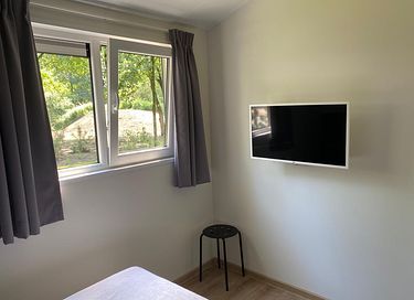 Chalet in het groen met modern comfort - 12
