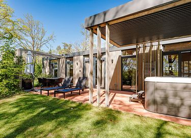 Lodge with an outdoor hot tub and a view - 20