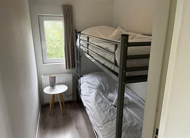 Tiny House met terras bij een mooi strand - 11
