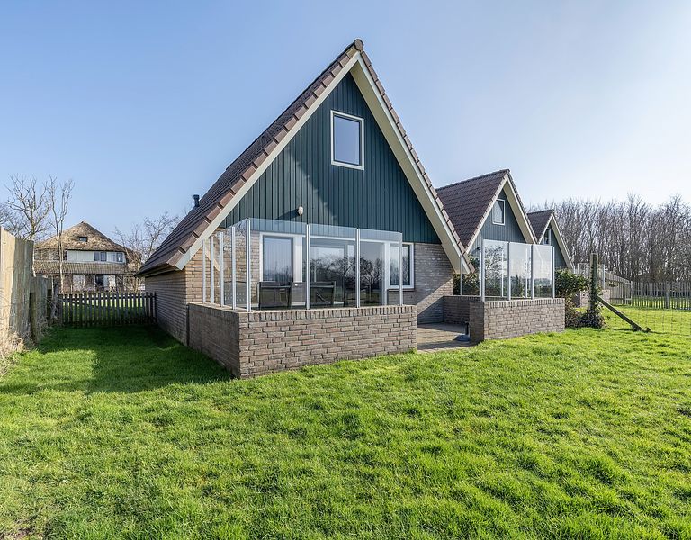 Freistehender Bungalow mit eingezäuntem Garten - 1