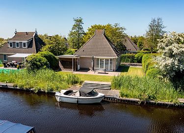 Waterfront holiday home with private sauna