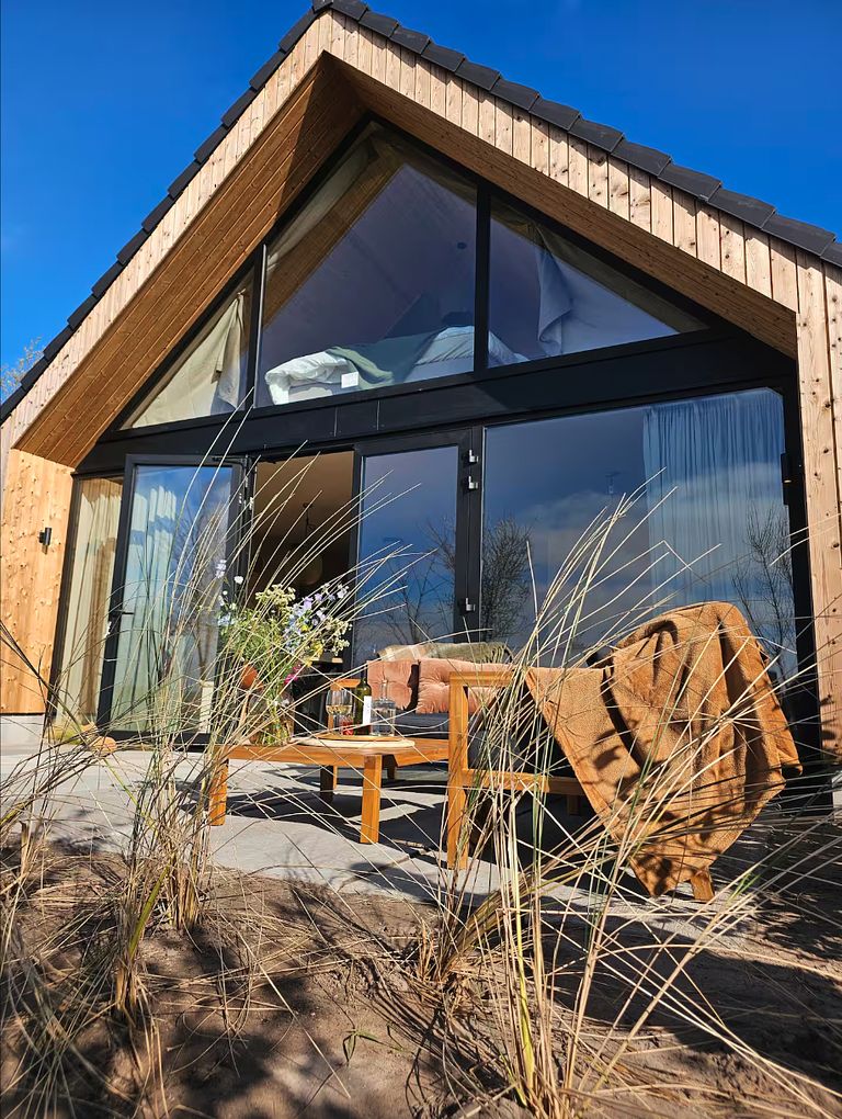 Modern holiday home in the dunes near the sea - 1