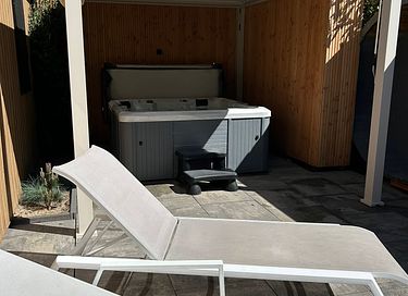 Luxe wellneslodge met jacuzzi en sauna - 11