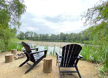 Knus verblijf direct aan het water in een bos - 3
