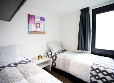 6-persoons design huis op een gezellig park - 9