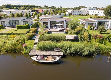Luxury waterfront villa with garden