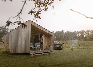 Tiny House mit Whirlpool in den Wäldern