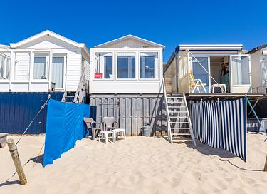 Maison de plage endormie au bord de la mer en Zélande