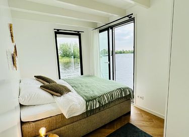 Unieke waterbeleving op luxe woonboot - 11