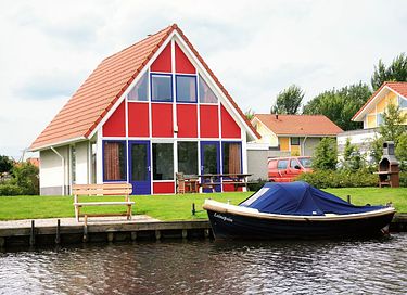 Vrijstaande villa (4p) aan het water