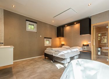 Wellness-Hütte mit Sauna und Whirlpool im Wald - 8