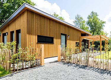 Boslodge met privé hottub en sauna