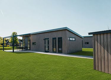 Comfortabele lodge met eigen fietsenschuur