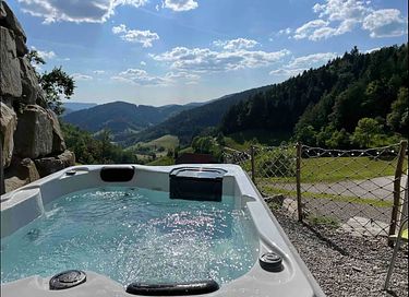 Luxury wellness accommodation with whirlpool and sauna