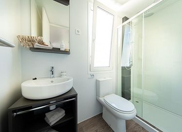 Knus Tiny House op een bosrijk vakantiepark - 7