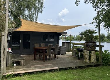 Blokhut op privé eiland met gratis motorboot - 11