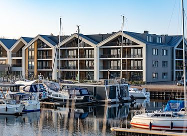 Apartment with sauna by the water