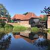 Boutique-Hotel mit Blick auf eine Wassermühle