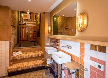 Luxe suite met bubbelbad in historisch hotel - 7