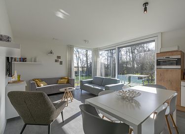 Bungalow met omheinde tuin bij de kust - 4
