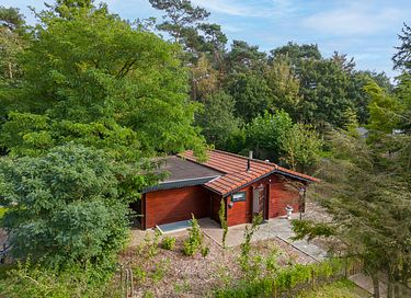 Robust log cabin with sauna in the forest