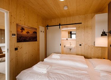 Lodge with an outdoor hot tub and a view - 13