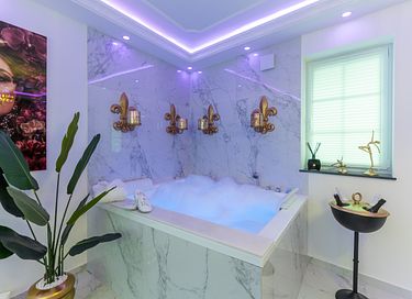 Appartement avec sauna et bain à remous privés