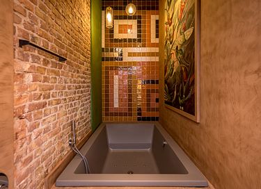 Luxe suite met bubbelbad in historisch hotel - 8