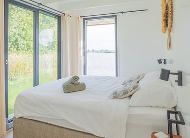 Unieke waterwoning met dakterras - 12