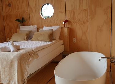 Wikkelhuisje met sauna aan het water - 16