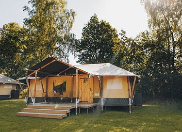 Luxury glamping tent (sleeps 6) at a charming vacation park