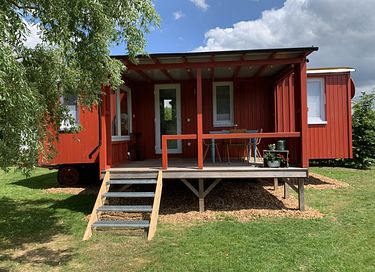 Tiny house on wheels in the middle of nature