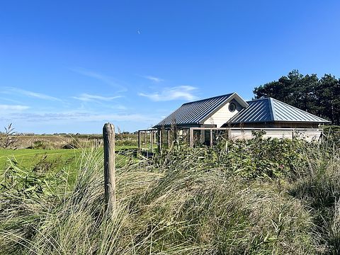 Vrijstaand huisje in een boomgaard op Texel - 2