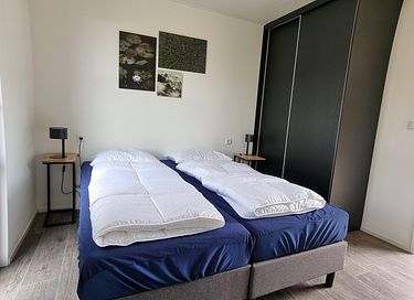 Modern vakantiehuis op park aan het water - 7