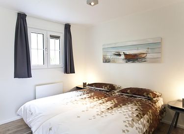 Vrijstaand vakantiehuisje dichtbij een meer - 9