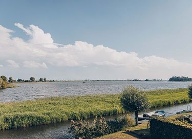 Rietgedekte villa met uitzicht over het meer - 44