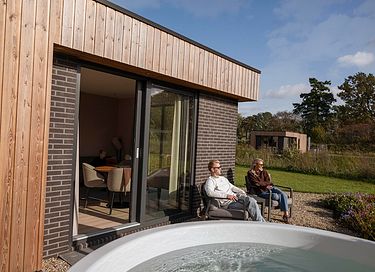 Lodge romantique avec sauna et bain à remous