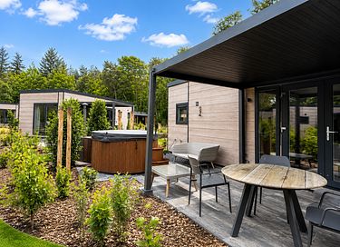 Modern lodge with a private hot tub in Drenthe