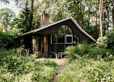 Romantic cottage in the forest with fireplace