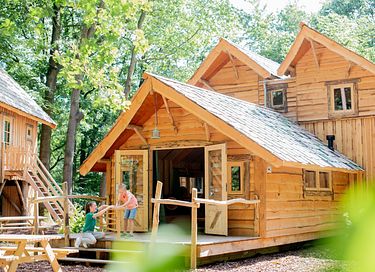 Unique wooden forest cabin with a sauna