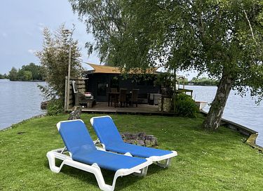 Blokhut op privé eiland met gratis motorboot