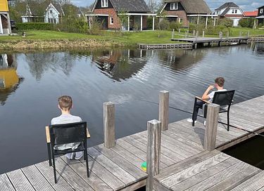 Luxe watervilla met aanlegsteiger - 18