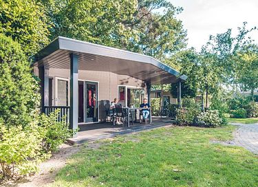 Bungalow with spacious porch on green park