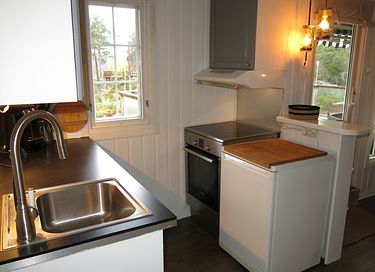Houten huisje met rivierzicht - 13