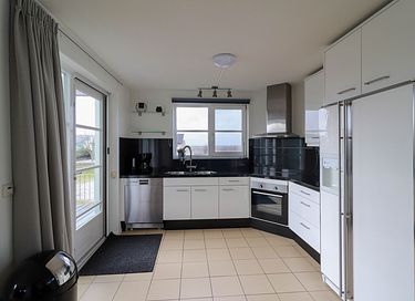 Stijlvolle strandvilla met hottub en uitzicht - 10
